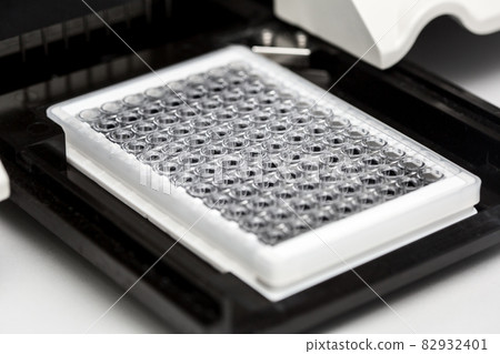 A chemical sample bottle. Centrifuge. A test tube vial sets for analysis. A chemical sample bottle. Centrifuge. A test tube vial sets for analysis. 82932401