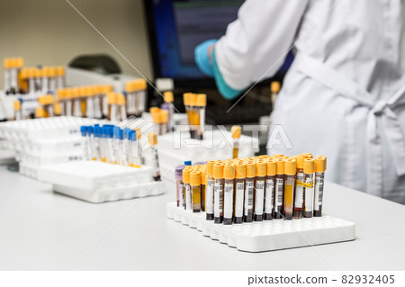 A chemical sample bottle. Centrifuge. A test tube vial sets for analysis. A chemical sample bottle. Centrifuge. A test tube vial sets for analysis. 82932405