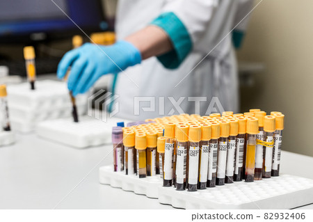 A chemical sample bottle. Centrifuge. A test tube vial sets for analysis. A chemical sample bottle. Centrifuge. A test tube vial sets for analysis. 82932406