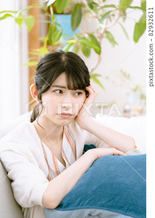 A woman suffering from illness A woman suffering from illness 82932611