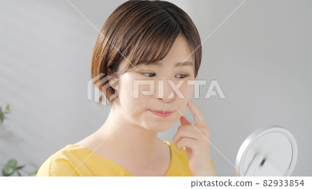 Beauty image Young woman face care 82933854