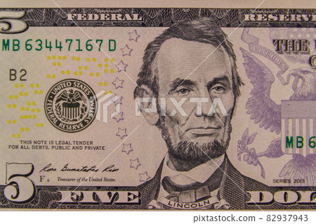 Macro shot of the five dollars banknote 82937943