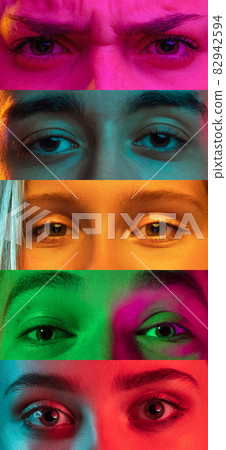 Vertical collage of open eyes of young multiethnic men and women on multicolored background. Concept of youth, unity, equality and diversity Vertical collage of open eyes of young multiethnic men and women on multicolored background. Concept of youth, unity, equality and diversity 82942594