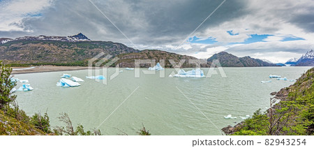 Panoramic image over Lago Grey with icebergs in Torres del Paine National Park in Patagonia in summer Panoramic image over Lago Grey with icebergs in Torres del Paine National Park in Patagonia in summer 82943254