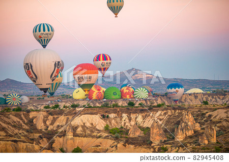 Bright hot air balloons in sky of Cappadocia, Turkey 82945408