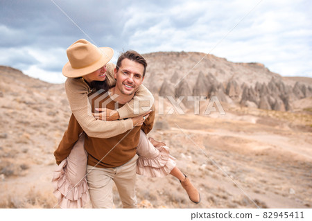 Happy couple on summer vacation in famous place. Cave formations. Happy couple on summer vacation in famous place. Cave formations. 82945411
