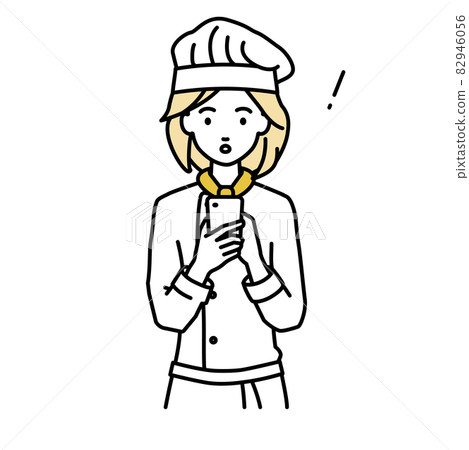 A cook woman who was surprised to notice something while standing and operating a smartphone A cook woman who was surprised to notice something while standing and operating a smartphone 82946056