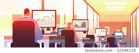 mix race traders stock market brokers analyzing charts or making presentation on computer monitors at workplace mix race traders stock market brokers analyzing charts or making presentation on computer monitors at workplace 82946238