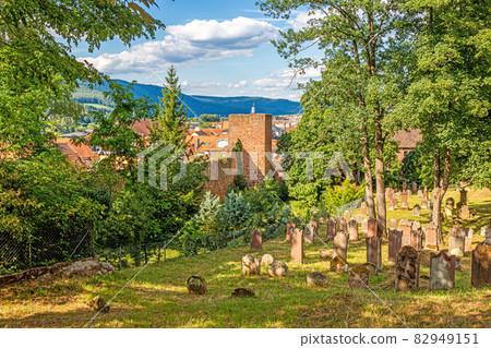 View on the old jewish cemetery and city wall of the medieval city of Miltenberg in Germany during daytime View on the old jewish cemetery and city wall of the medieval city of Miltenberg in Germany during daytime 82949151