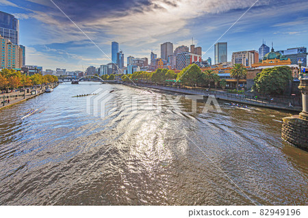 Panoramic view of Melbourne skyline taken from a bridge over the Yarra river Panoramic view of Melbourne skyline taken from a bridge over the Yarra river 82949196