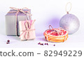 Christmas gifts in craft style with slices of dry grapefruit 82949229
