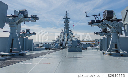 Close up pictures of old WW2 battleship during daytime Close up pictures of old WW2 battleship during daytime 82950353