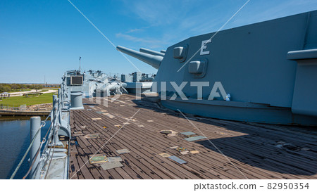 Close up pictures of old WW2 battleship during daytime Close up pictures of old WW2 battleship during daytime 82950354