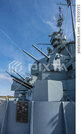 Close up pictures of old WW2 battleship during daytime Close up pictures of old WW2 battleship during daytime 82950355