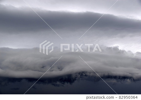 Storm hurricane blue leaden torn clouds on the horizon Storm hurricane blue leaden torn clouds on the horizon 82950364