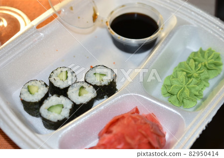 Japanese lunch sushi and salmon rolls 82950414