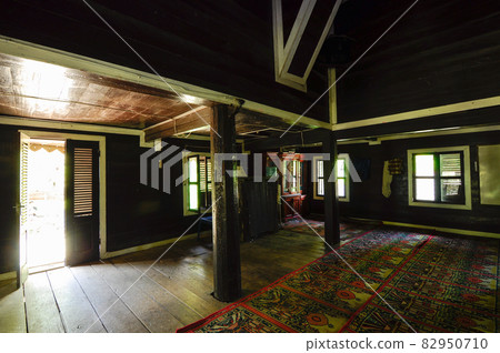 WEST SUMATERA, INDONESIA -JUNE 8, 2014: Tuo Kayu Jao Mosque is located in West Sumatra, Indonesia. Built in 1599 and is the second oldest mosque in Indonesia. WEST SUMATERA, INDONESIA -JUNE 8, 2014: Tuo Kayu Jao Mosque is located in West Sumatra, Indonesia. Built in 1599 and is the second oldest mosque in Indonesia. 82950710