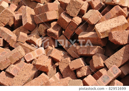 JASIN, MALAYSIA -APRIL 08, 2016: Clay brick arranged to form brick wall. JASIN, MALAYSIA -APRIL 08, 2016: Clay brick arranged to form brick wall. 82951699