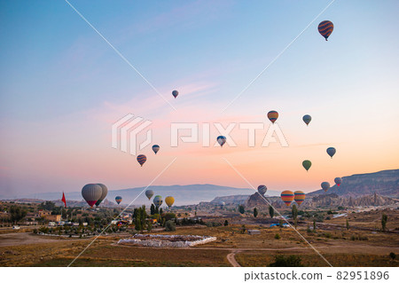 Bright hot air balloons in sky of Cappadocia, Turkey Bright hot air balloons in sky of Cappadocia, Turkey 82951896