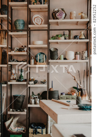 Ceramic studio for craft work with clay, color, glaze. Daylight in art loft space 82952252
