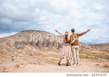 Happy couple on summer vacation in famous place. Cave formations. 82953279