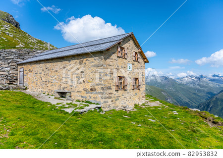 Old Prague Hut, German: Alte Prager Hutte. Small stone tourist house southeast of Grossvenediger, Hohe Tauern National Park, East Tyrol, Austria 82953832