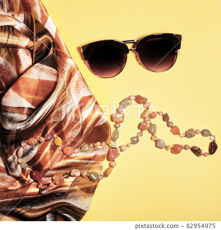 Flat lay fashion set: two sunglasses on pastel Flat lay fashion set: two sunglasses on pastel 82954975