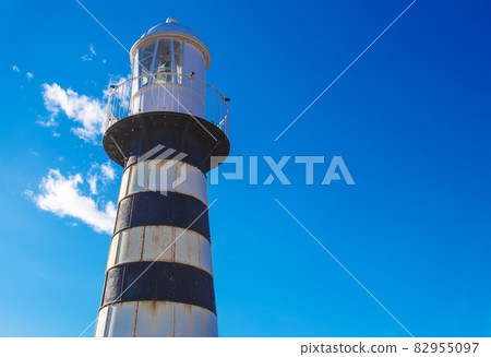 Lighthouse in Kamchatka Peninsula is located on Mayachny Cape on shore of picturesque Avacha Gulf in the Pacific Ocean Lighthouse in Kamchatka Peninsula is located on Mayachny Cape on shore of picturesque Avacha Gulf in the Pacific Ocean 82955097