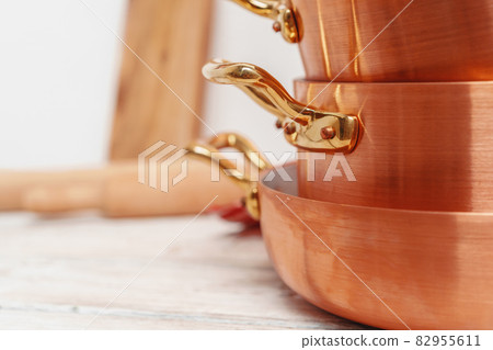 kitchen for professional use with lots of copper pots 82955611