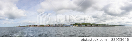 Panoramic view on the beach of the German village Laboe at the baltic sea in summer Panoramic view on the beach of the German village Laboe at the baltic sea in summer 82955646