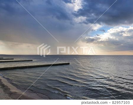 Stormy clouds sky over Baltic Sea coast at dusk 82957103