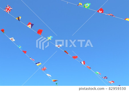 The national flags of the athletic meet fluttering in the clear sky The national flags of the athletic meet fluttering in the clear sky 82959330