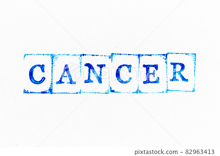 Blue color ink rubber stamp in word cancer on white paper background 82963413
