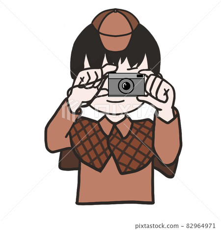 Young detective holding a camera (male 1) 82964971