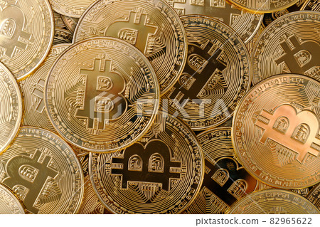 Close up shot of Bitcoin coins on black background, A pile of Bitcoin Cryptocurrency Gold Bitcoin BTC Bit Coin. Digital blockchain technology, bitcoin mining concept Close up shot of Bitcoin coins on black background, A pile of Bitcoin Cryptocurrency Gold Bitcoin BTC Bit Coin. Digital blockchain technology, bitcoin mining concept 82965622