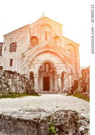 Church, located Racha region of Georgia, lower Svaneti mountains. Sun flare Church, located Racha region of Georgia, lower Svaneti mountains. Sun flare 82968212