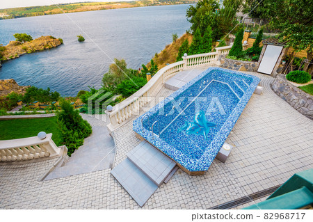 Backyard with small beautiful swimming pool 82968717
