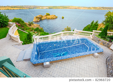 Backyard with small beautiful swimming pool 82968720