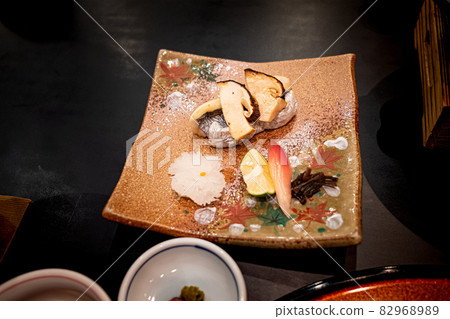 Japanese food with matsutake mushrooms and grilled cutlass fish with sudachi Japanese food with matsutake mushrooms and grilled cutlass fish with sudachi 82968989