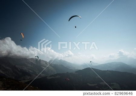 paragliding flight in the mountains. Le Grand-Bornand, France 82969646