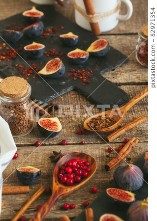 New Year composition with mulled wine on dark wooden background New Year composition with mulled wine on dark wooden background 82971354