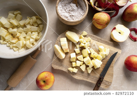 Cutted and peeled apples. Cooking an apple pie or tart. Step by step recipe. 82972110