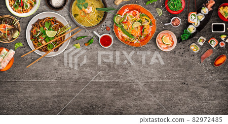 Various of asian meals on rustic background , top view , place for text. Various of asian meals on rustic background , top view , place for text. 82972485