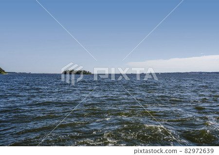 Tsubutejima seen from the vicinity of Shinseto Bridge on the Lake Hamana sightseeing boat 82972639