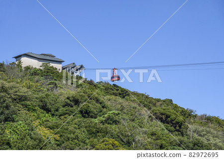 Kanzanji Ropeway looking up from a pleasure boat Kanzanji Ropeway looking up from a pleasure boat 82972695