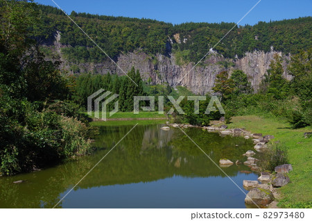 Columnar joint cliffs and stone droppings seen from Midama Park, Tsunan Town Columnar joint cliffs and stone droppings seen from Midama Park, Tsunan Town 82973480