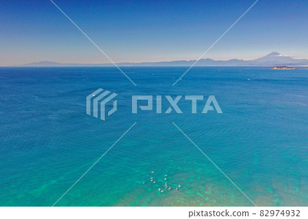 A drone photo of the marine blue sea and Mt. Fuji, aerial view from the sea, overlooking the clear Mt. Fuji and Enoshima from the sea 82974932