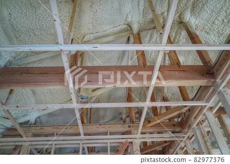 Spray insulation on the ceiling and perimeter of new homes 82977376