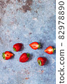 White marshmallows and strawberries with coffee on a blue metal background. Free space for text.Top view.Holiday and festive food concept 82978890