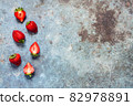 White marshmallows and strawberries with coffee on a blue metal background. Free space for text.Top view.Holiday and festive food concept 82978891